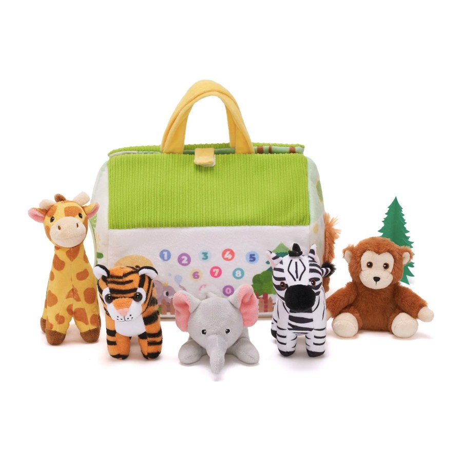 A green soft carry house with a yellow handle, with a plush giraffe, tiger, elephant, zebra and monkey sitting in front of it.